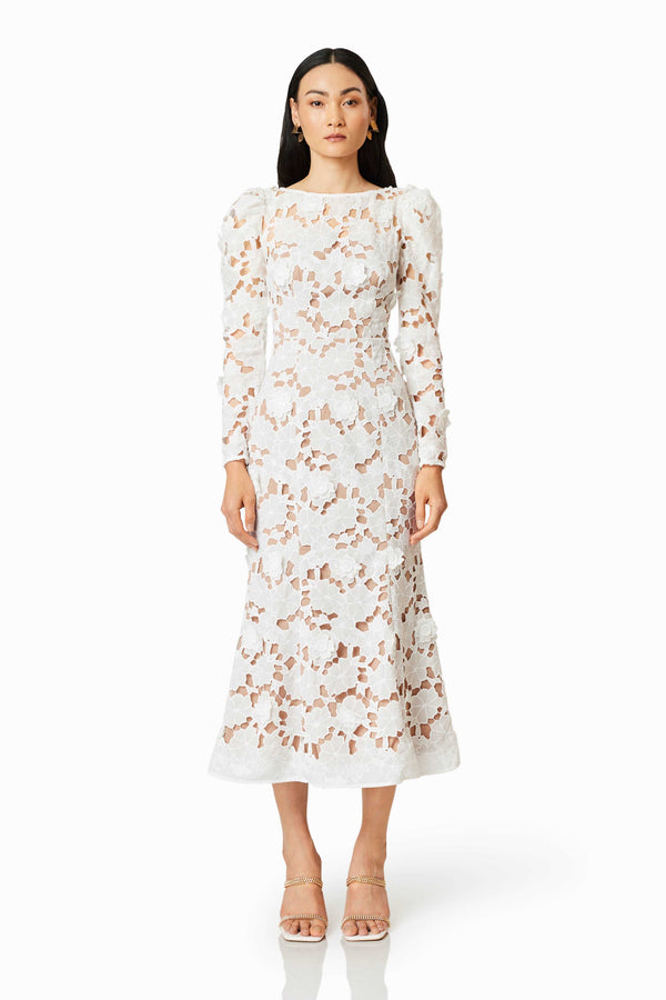 Black hair model wearing CALM FLORAL LACE MIDI DRESS IN WHITE front shot