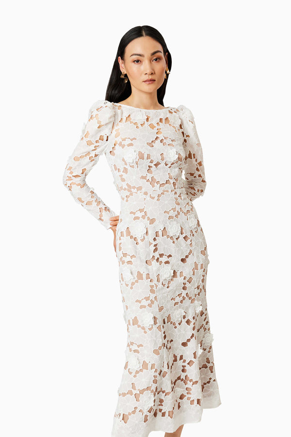 Black hair model wearing CALM FLORAL LACE MIDI DRESS IN WHITE close up shot