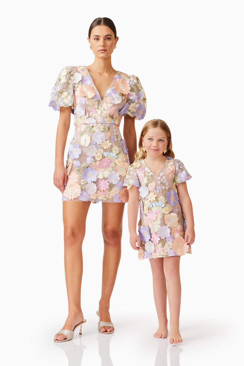 Female model posing with a child model wearing Anthea Embroidered Dress in Purple front shot