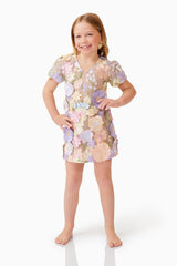 Blonde model wearing Anthea Embroidered Girls Dress in Purple hands on hips pose