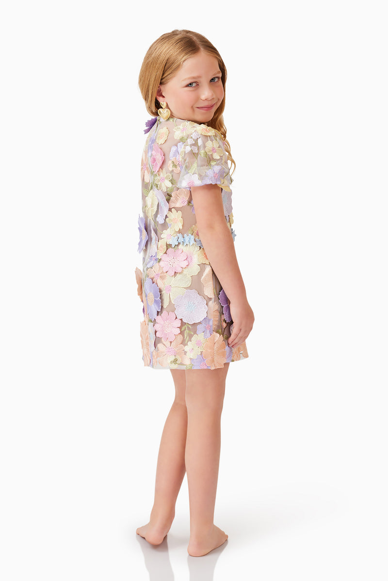 Blonde model wearing Anthea Embroidered Girls Dress in Purple back and side shot