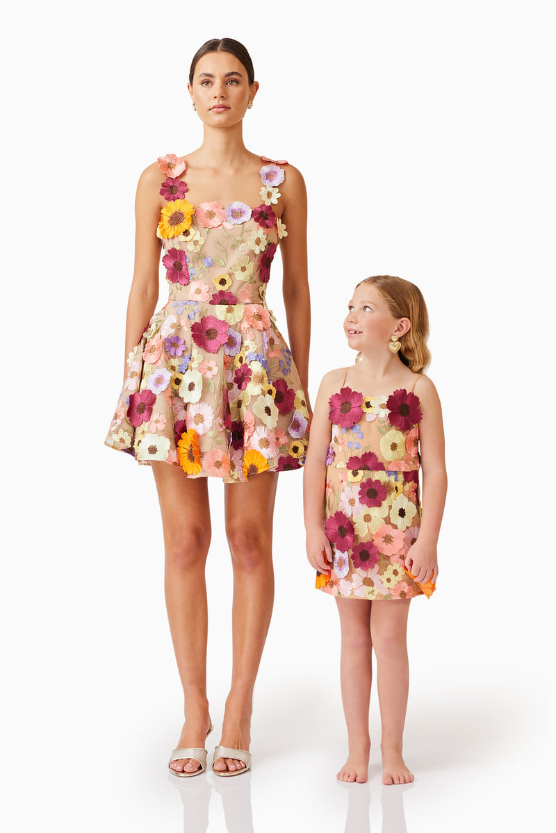 Female model posing with child model wearing Rosalind Dress in Floral looking away shot