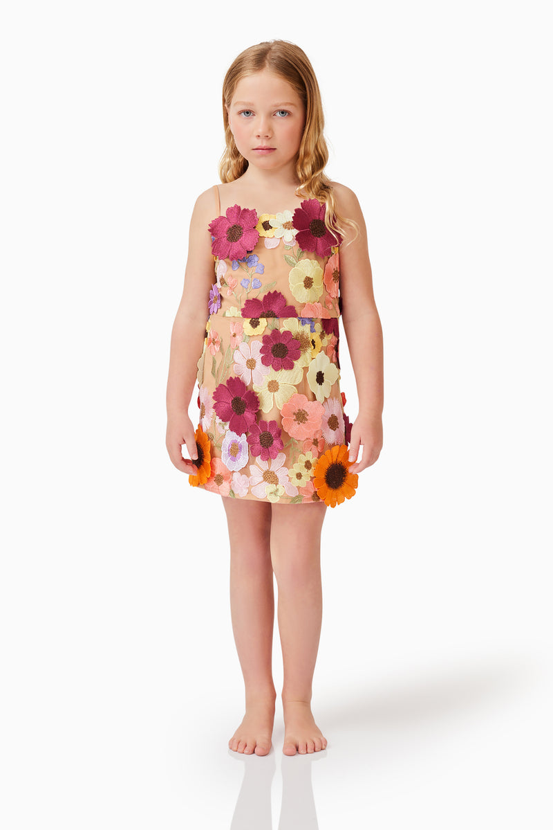 Blonde child model wearing Rosalind Girls Dress in Floral front shot