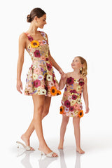 Female model posing with child model wearing Rosalind Dress in Floral holding hand shot