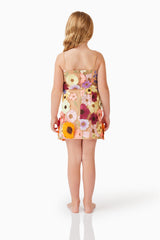 Blonde child model wearing Rosalind Girls Dress in Floral back shot