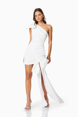 model wearing Bethany Mini Bow Party Dress In White front shot