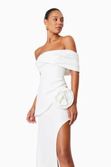 Model wearing Bethany Off The Shoulder Maxi Gown In White side shot