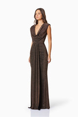 model wearing Nalani Fitted Maxi Dress In Brown side shot