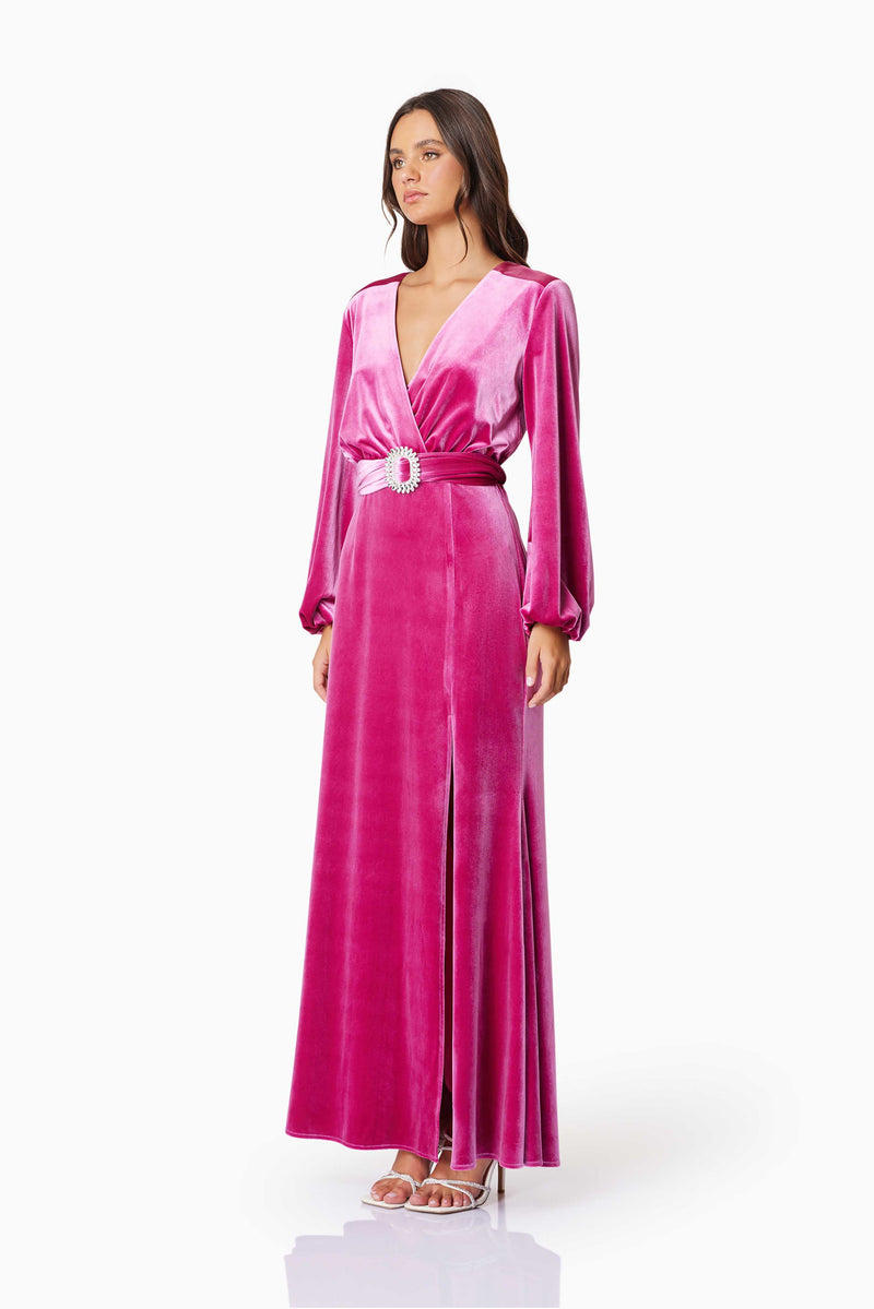 model wearing Solene Eventwear Maxi Dress In Pink side shot