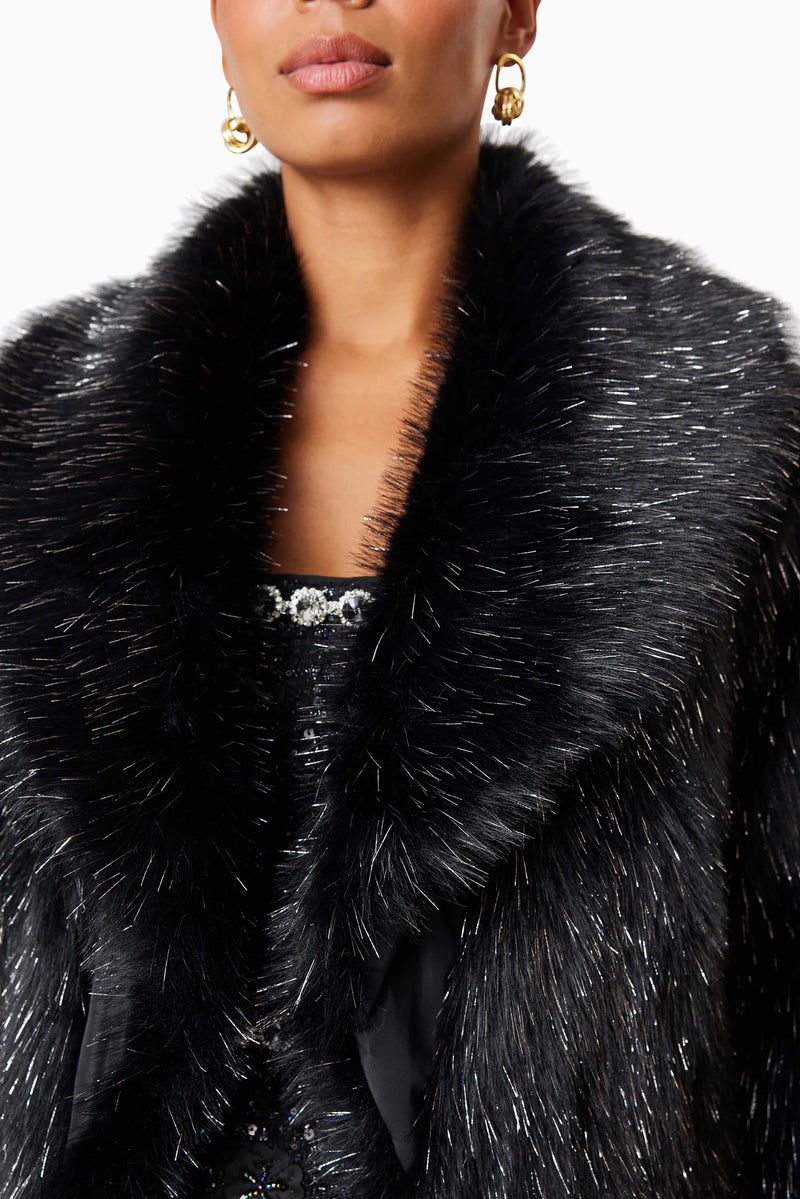 model wearing Cosette Faux Fur Coat In Black close up shot