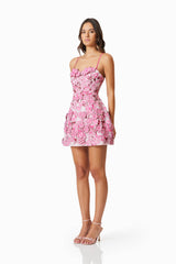 model wearing Roseate 3D Floral Mini Dress In Pink side shot