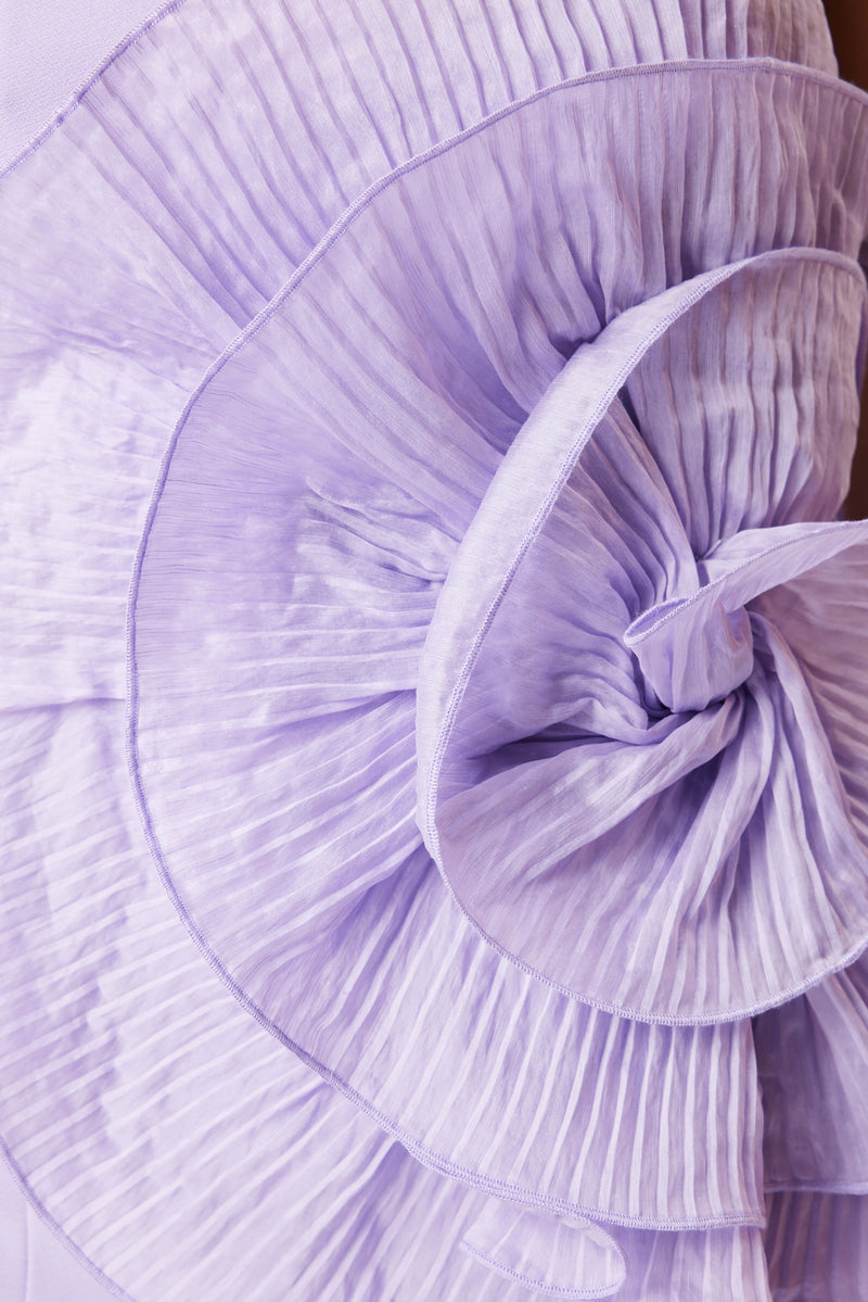 model wearing Peacock Floral Mini Dress In Purple close up shot