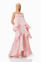 blonde model wearing Swallowtail Day To Night Maxi Dress In Pink side shot