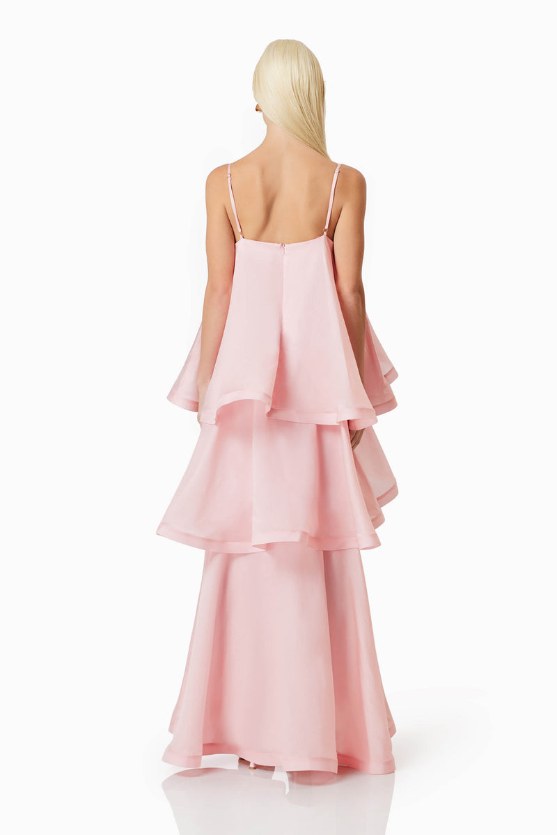 blonde model wearing Swallowtail Day To Night Maxi Dress In Pink back shot