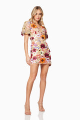 model wearing 3D floral Rosalind mini dress in multi side shot